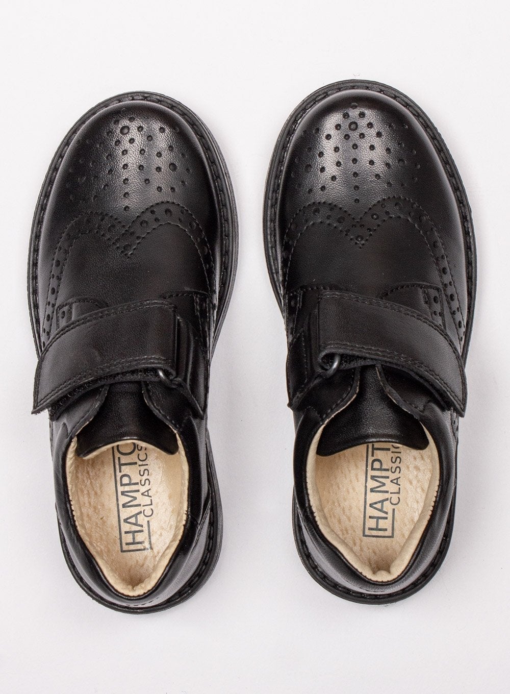 https://www.trotterslondon.com/cdn/shop/products/hampton-classics-school-shoes-hampton-classics-gregory-school-shoes-in-black-28609672544317.jpg?v=1657619348
